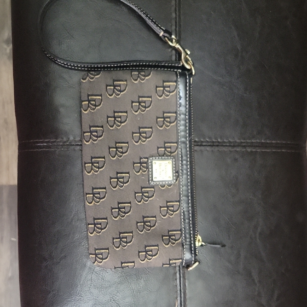 Dooney & Bourke Black and Gold Clutch with Monogram Pattern